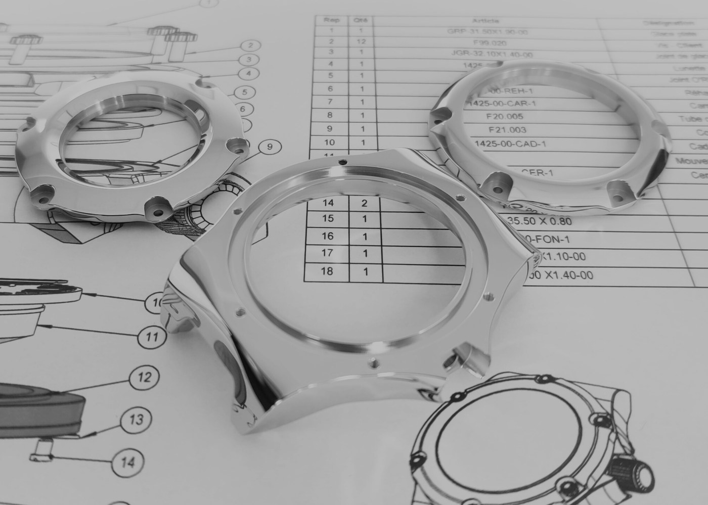 Componenti della cassa accanto a disegni tecnici, Baresi & Caine
